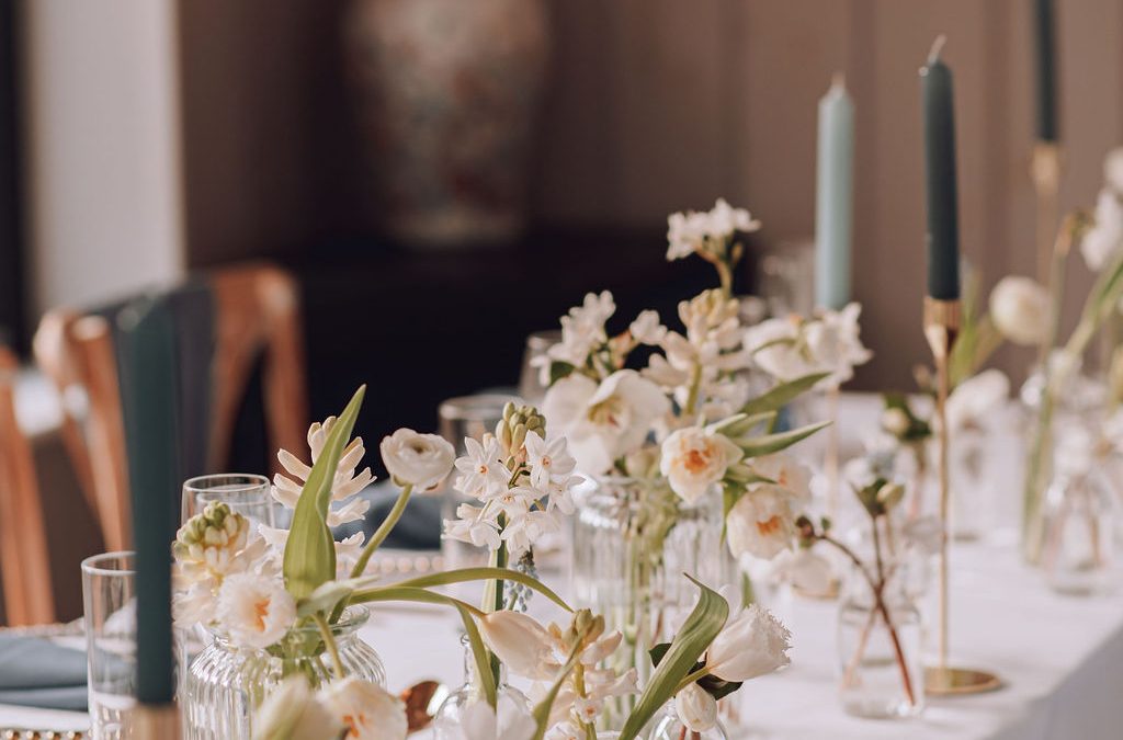 Wedding top table styling with fresh flowers, and candlesticks